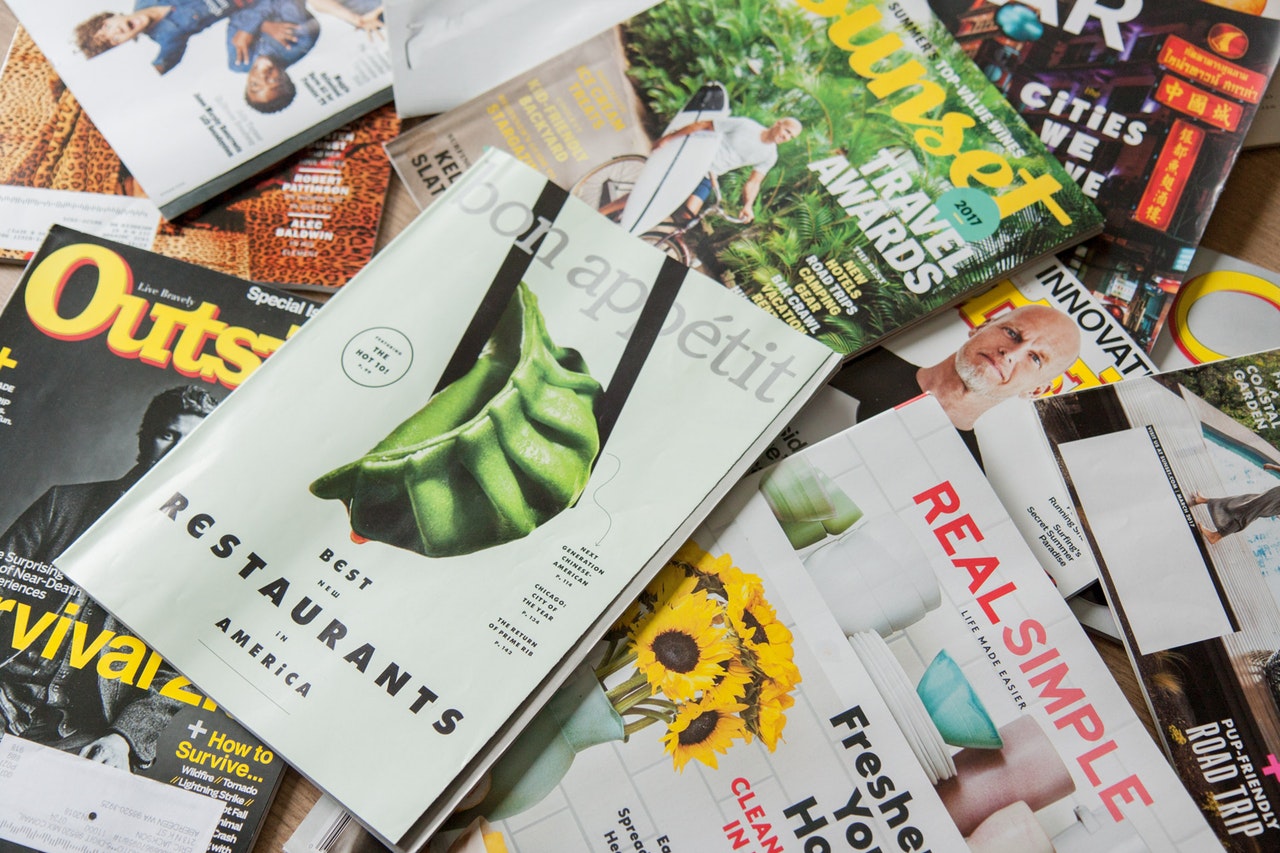 An array of magazines including bon appetit magazine and Real Simple Magazine