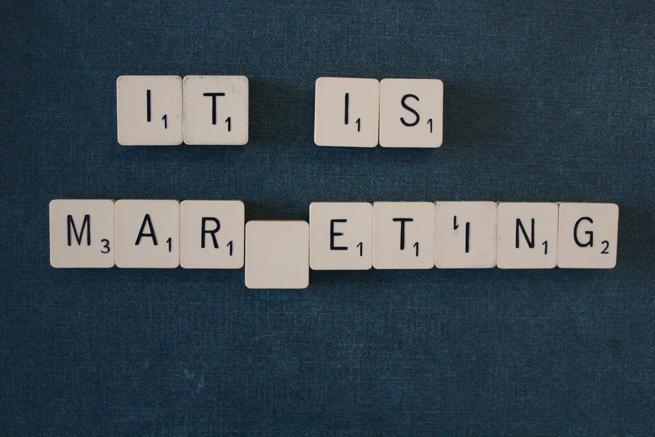 'IT IS MARKETING' written in scrabble pieces 'IT IS MARKETING' written in scrabble pieces
