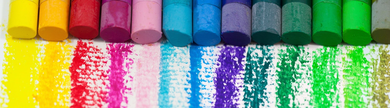 A row of colouring pastels in different colours